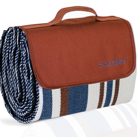 Scuddles extra-large picnic blanket on lawn provides spacious 60x60 inches for family picnics.
