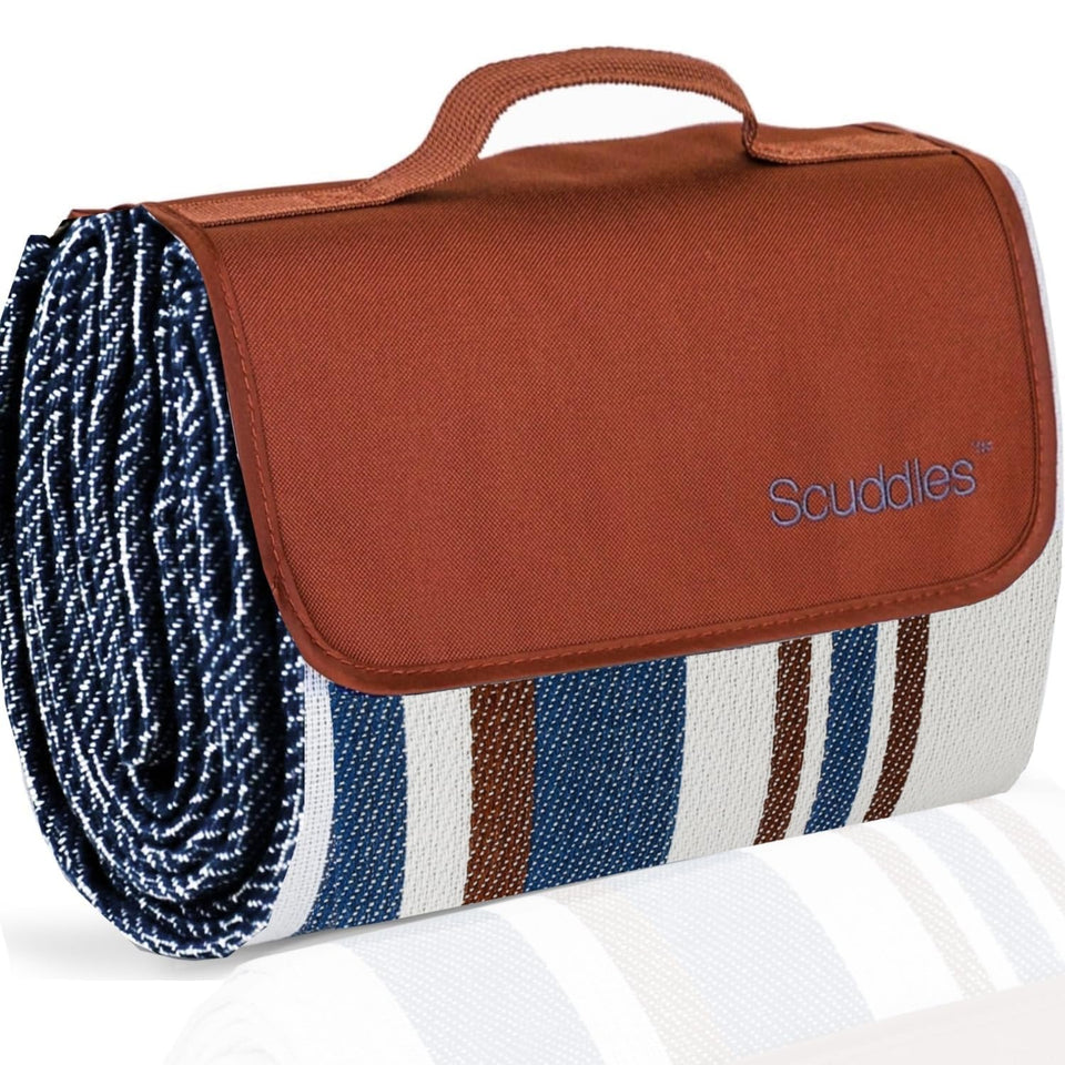 Scuddles extra-large picnic blanket on lawn provides spacious 60x60 inches for family picnics.