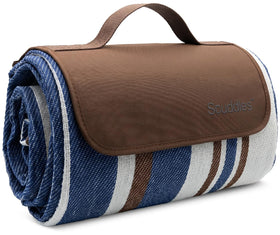 Scuddles picnic blanket front view on grass with tartan design for outdoor meals