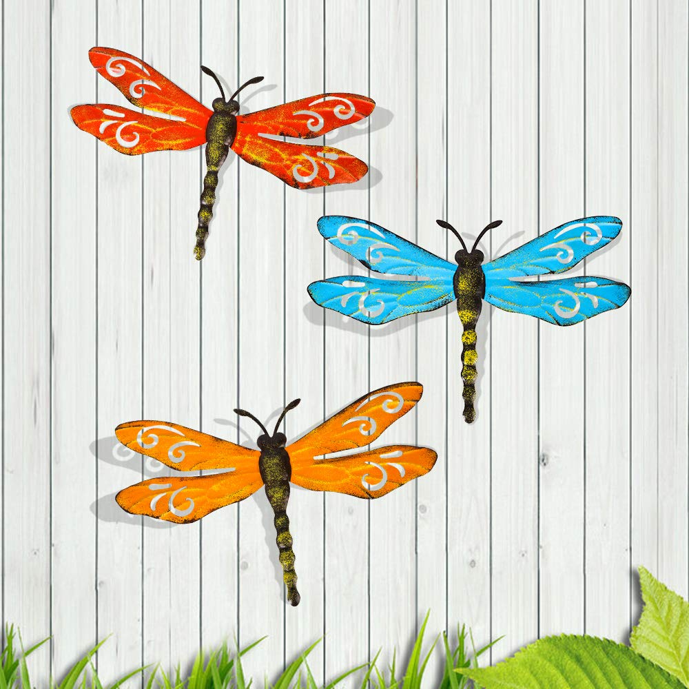 Scwhousi metal dragonfly wall decor for outdoor spaces adds rustic charm.