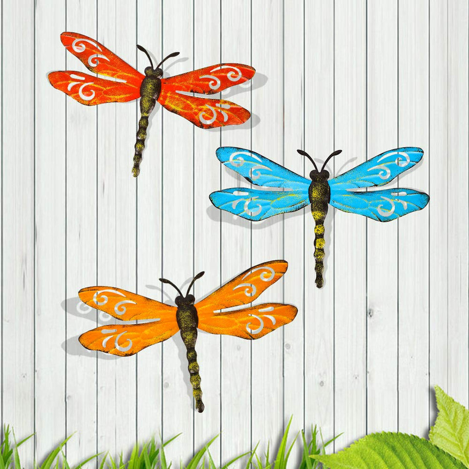 Scwhousi metal dragonfly wall decor for outdoor spaces adds rustic charm.