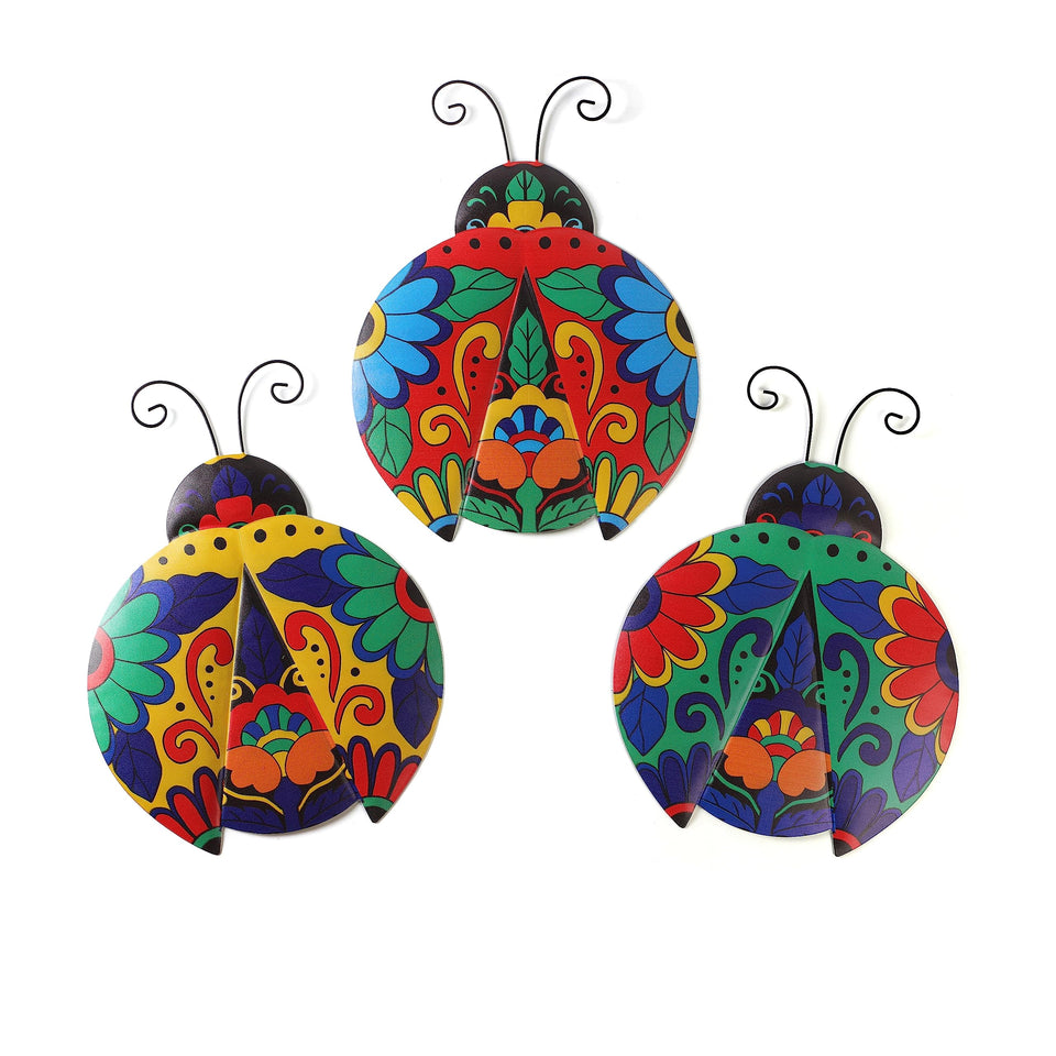 Scwhousi metal ladybugs wall decor trio adds vibrant garden charm on a fence
