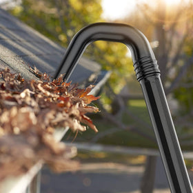 Sealegend in-use gutter cleaning from the ground showing efficient operation.