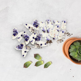 Seed Bloom large butterfly motif symbolizes remembrance and new beginnings in ceremonies.