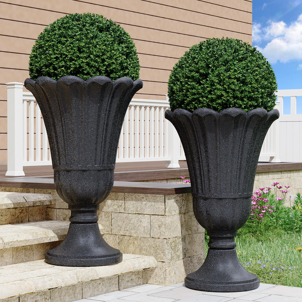 Seethmi tall planter with petal design for outdoor use, adds curb appeal.