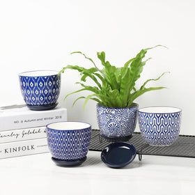 Vintage blue Selamica planter enhances home decor.