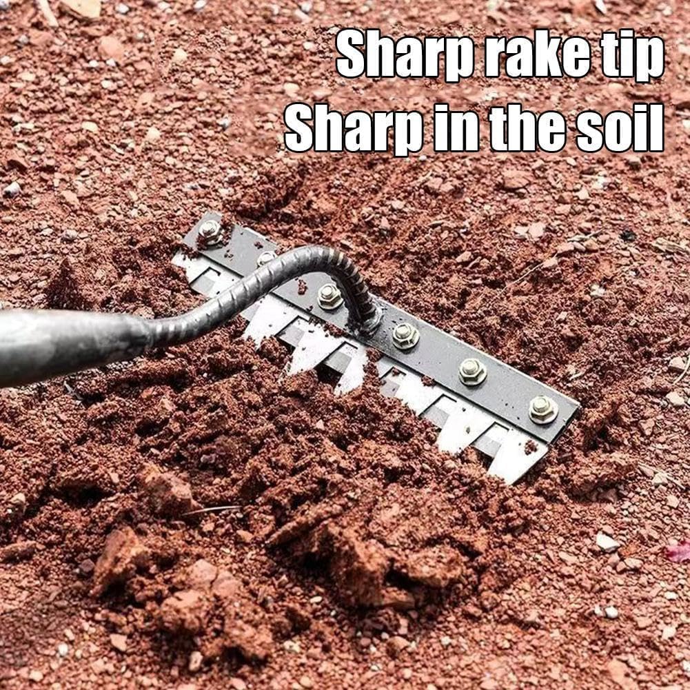 Semifrut weed rake used in a garden bed for debris clearance.