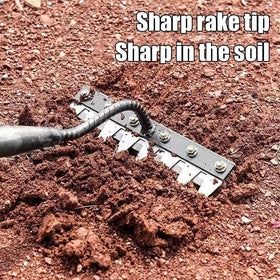 Semifrut weed rake used in a garden bed for debris clearance.
