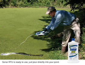 Efficient pond water treatment with SePRO Sonar RTU showing weed reduction.