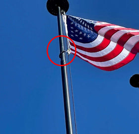 Service First durable flagpole accessory on an outdoor display.