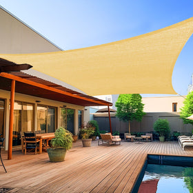 Shade&Beyond 8x10 sun shade sail in sand blocks UV rays for patios.