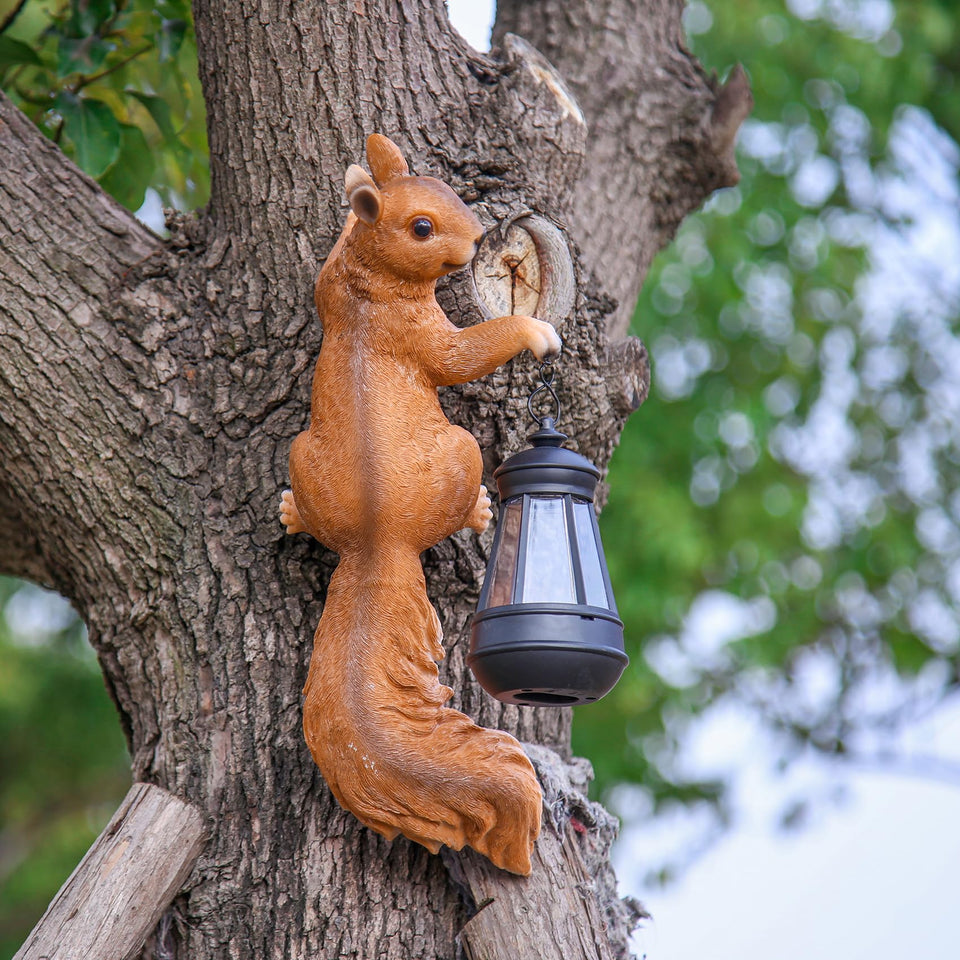 SHAODIE solar squirrel lantern sculpture glowing at dusk for garden ambiance