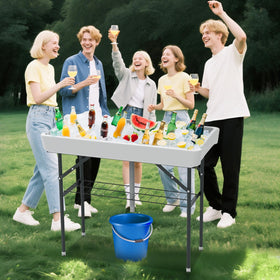 ShareWIN ice table set up at an outdoor party on a sunny day.