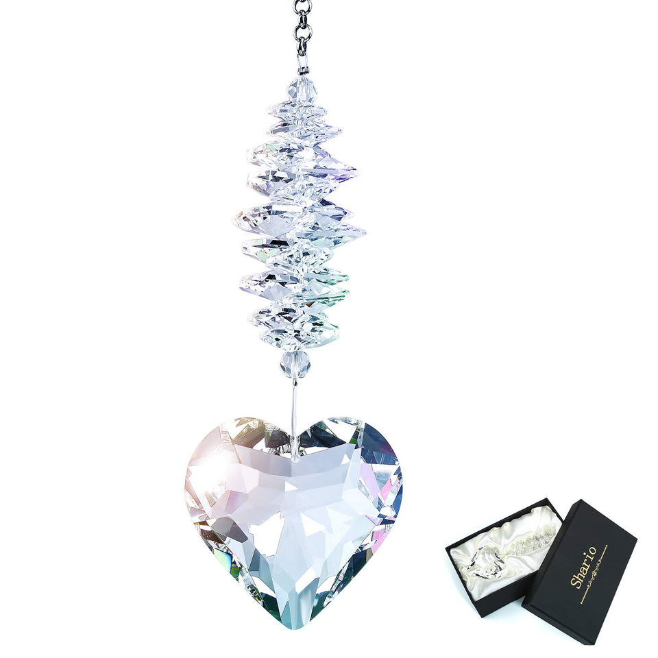 Shario clear glass heart crystal ball pendant capturing sunlight and creating reflections