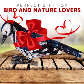 Shefio large metal bird statue creates a focal point in a yard
