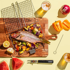 SHIZZO grill variety foods shows capacity for meats, seafood, veggies.