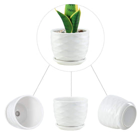 Sietpoek planter features drainage hole and connected saucer for tidy watering.