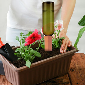 SiliFine automatic plant waterer insert enables hands-off watering.