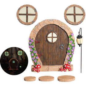 Simple Creativity fairy door on wall glows at night, creating magical ambiance