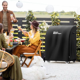 Simple Houseware grill cover on patio showing secure fit and presence.