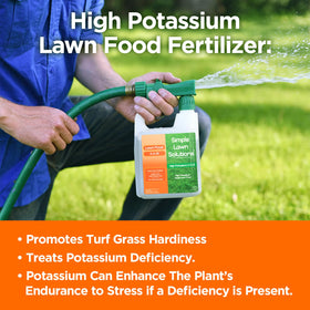 Pouring Simple Lawn Solutions liquid fertilizer during lawn treatment.