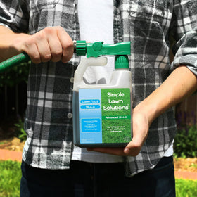 Simple Lawn Solutions spray bottle with ready-to-use fertilizer spray.