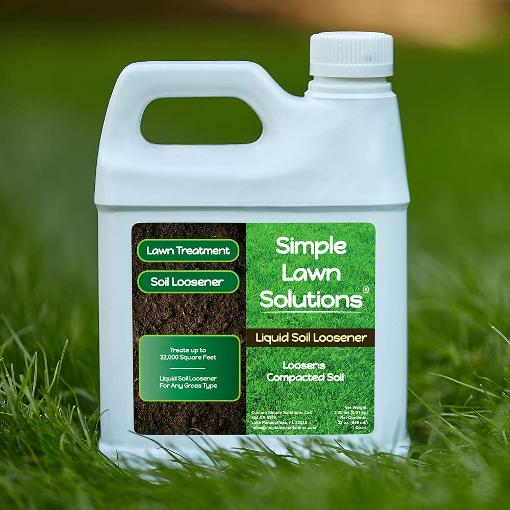Sprayer applying Simple Lawn Solutions Loosener for even coverage on turf.