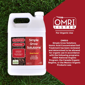 Root Hume spray application with hose-end sprayer for lawns.
