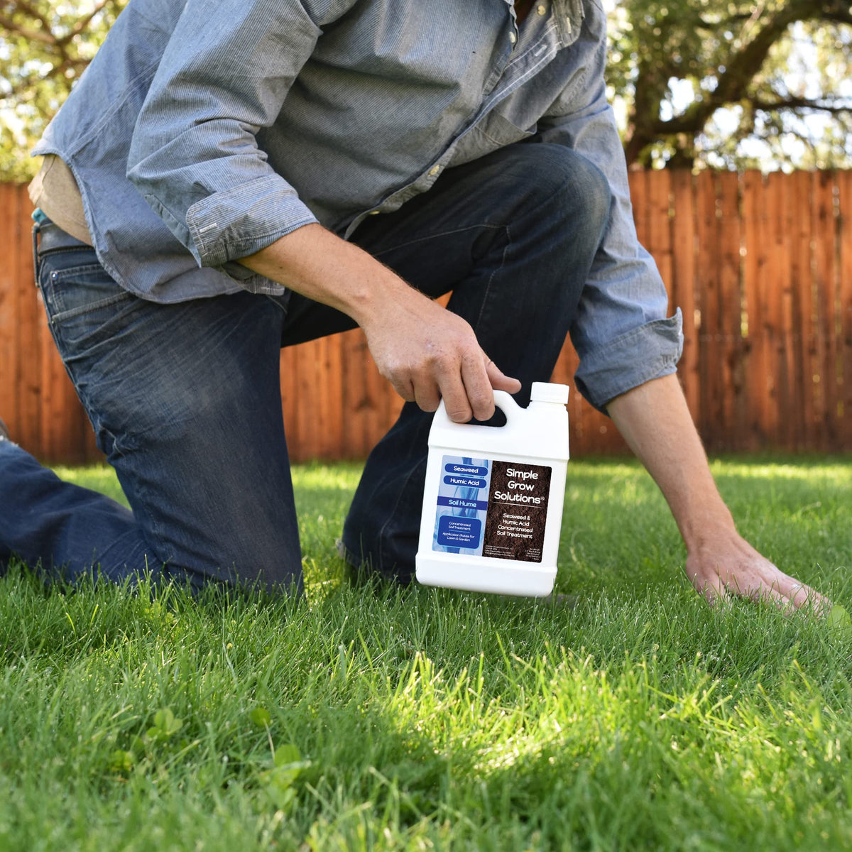 Simple Lawn Solutions Soil Hume sprayer application demonstrates easy hose-end or backpack use for coverage.