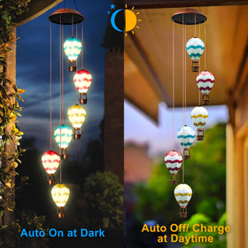 Singingarden hot air balloon wind chimes lit, playful decor that glows at dusk.