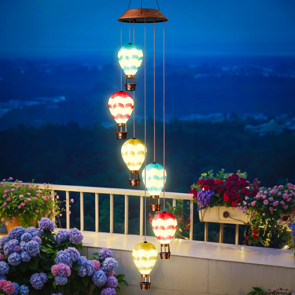 Singingarden solar wind chimes outdoor porch illuminate evenings with gentle ambient lighting.
