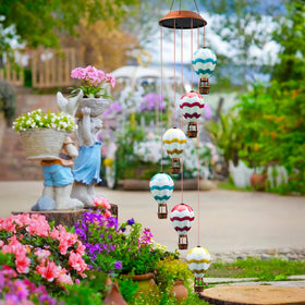 Singingarden weather-resistant wind chimes built to endure rain outdoors.