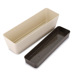 Skelang drainage-hole closeup with removable saucer tray
