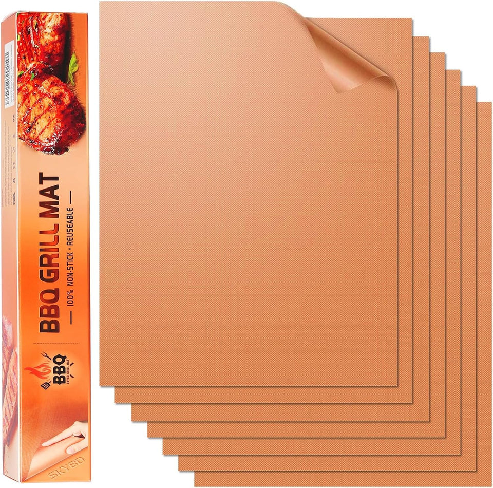 SKYBD copper grill mats set of 6 on a grill showing even sear marks and easy cleanup.