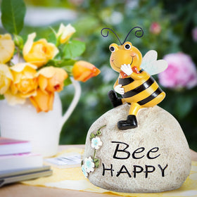 Smadeer bee outdoor statue perched on a stone adds playful patio charm.