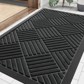 Smiry front door mat texture close-up showing dirt-trapping grooves for clean entryways.