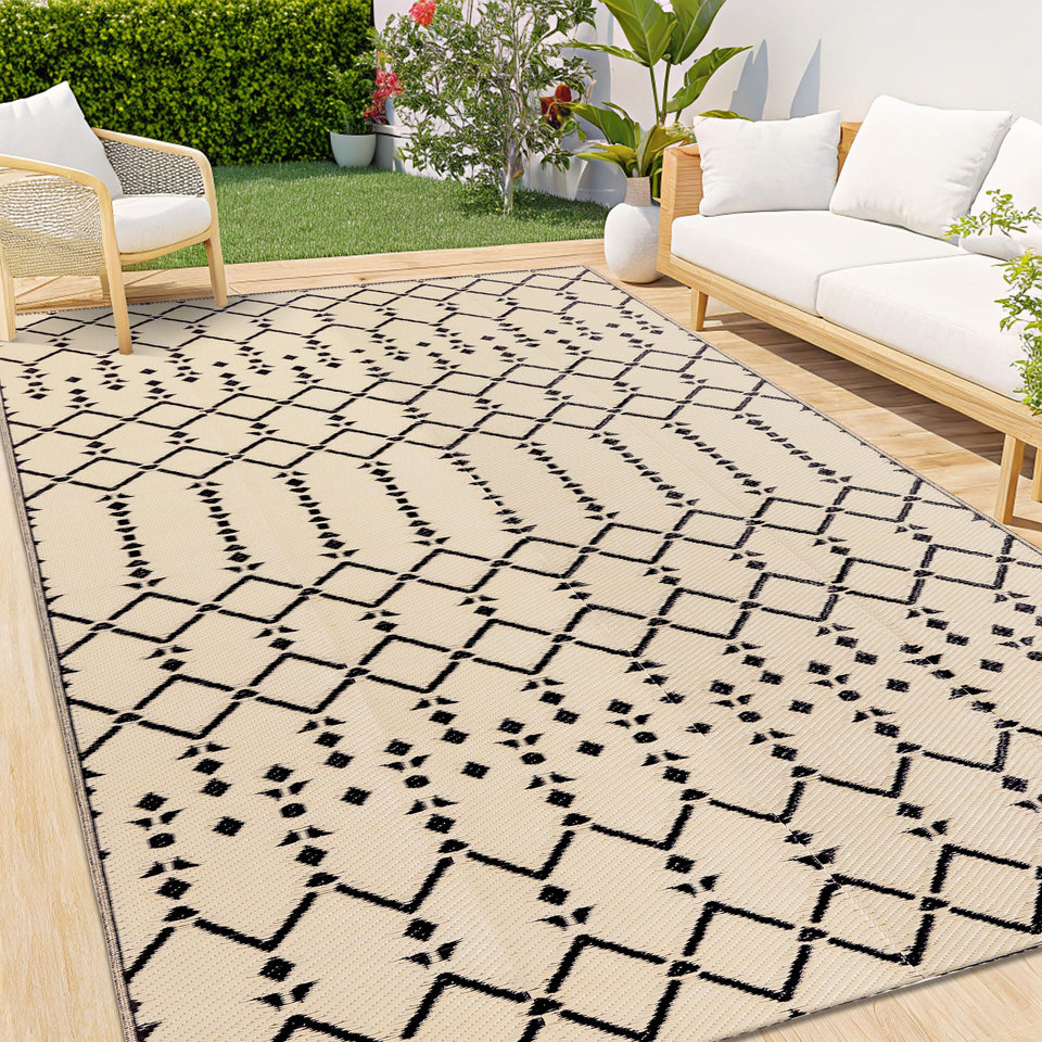 Smiry outdoor rug 5x8 beige with geometric pattern for patios.
