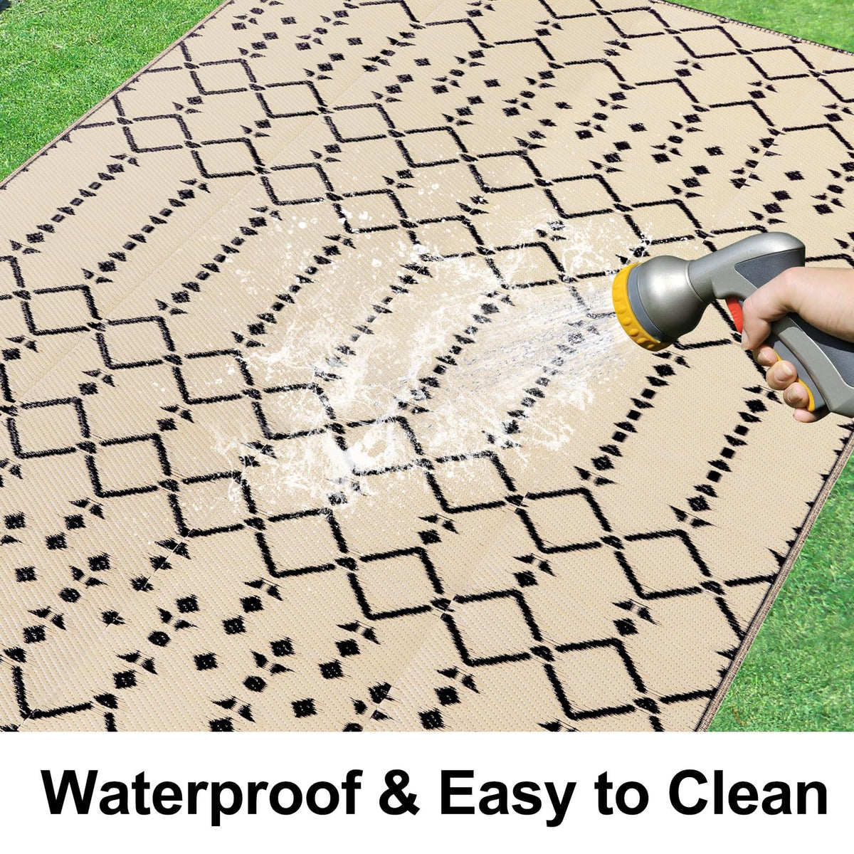 Smiry waterproof straw rug being cleaned with a hose after use.