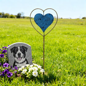 SMQLJXC pet memorial garden stake honors a beloved companion outdoors.