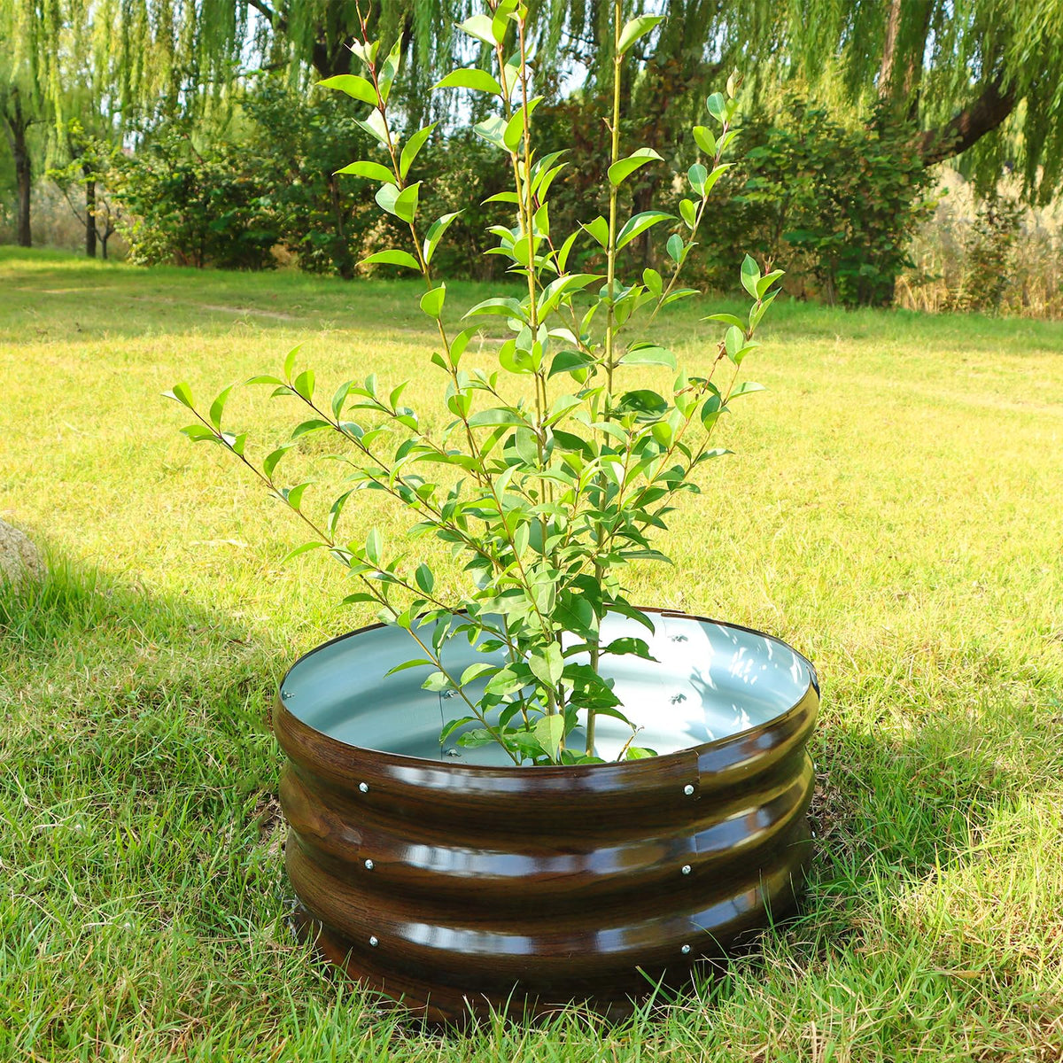 SnugNiture round galvanized bed interior supports root growth and air flow.
