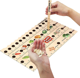 Snurfado Plant Ruler wooden seed spacing tool in use for even rows
