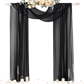 Socomi black sheer Gothic wedding draping over an arch creates soft, romantic lighting.
