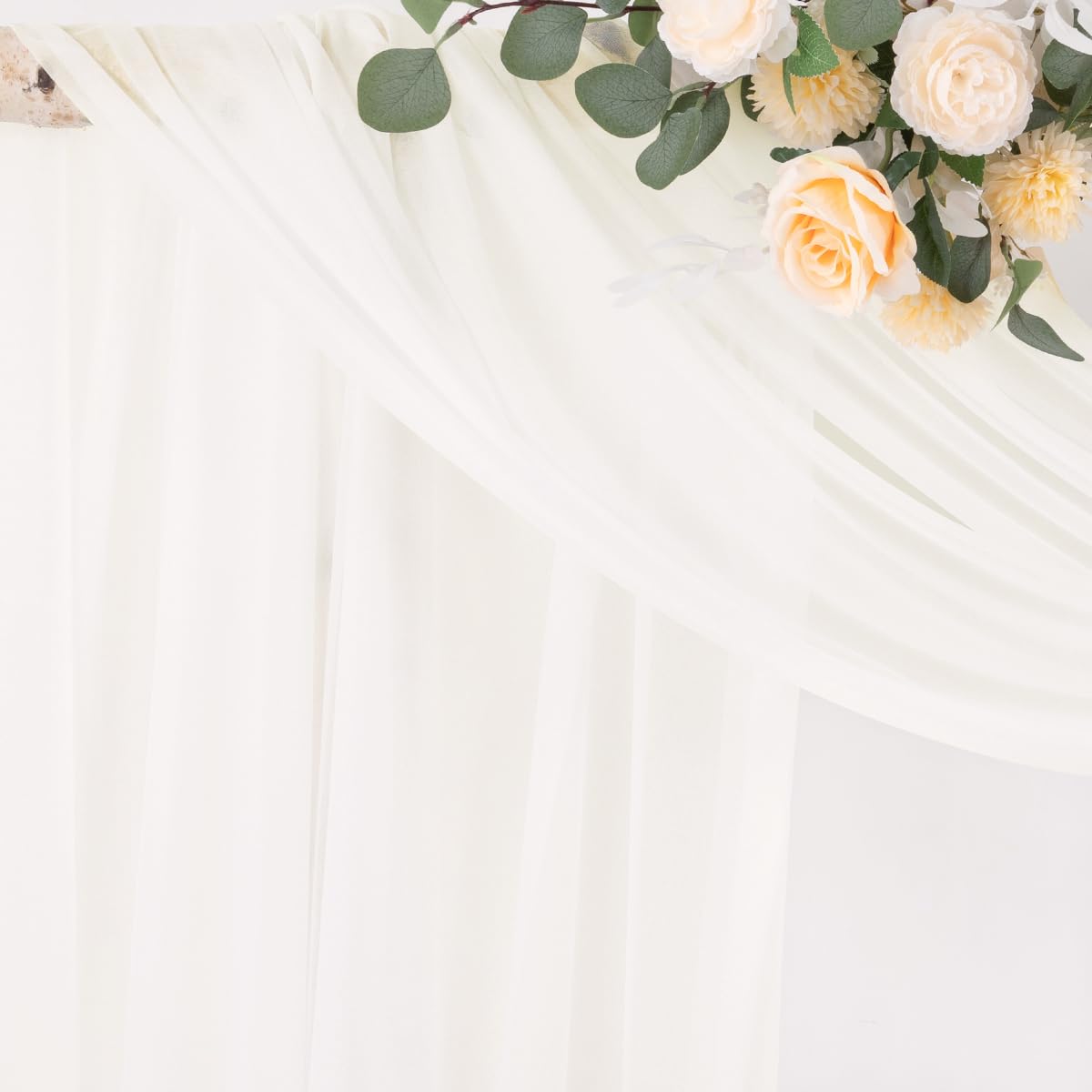Socomi arch draping on a chuppah creates romantic folds.
