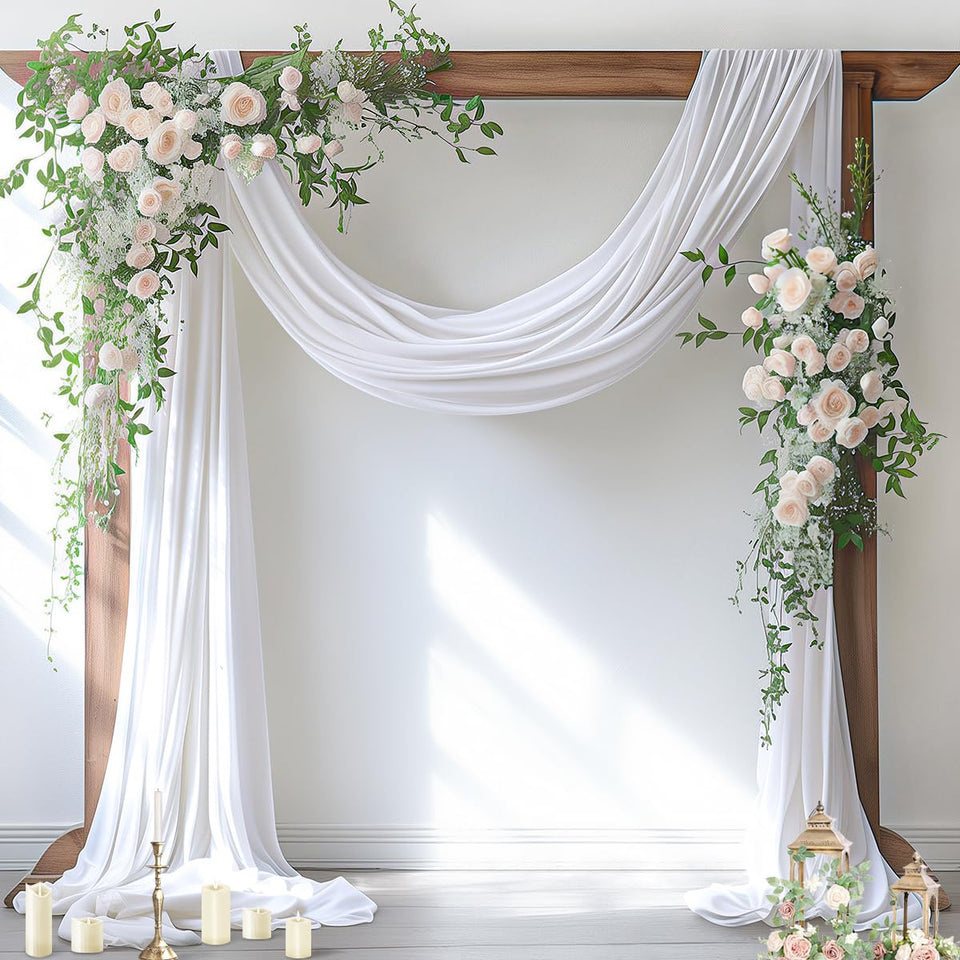 Socomi white sheer arch drape panel creates an elegant ceremony backdrop.