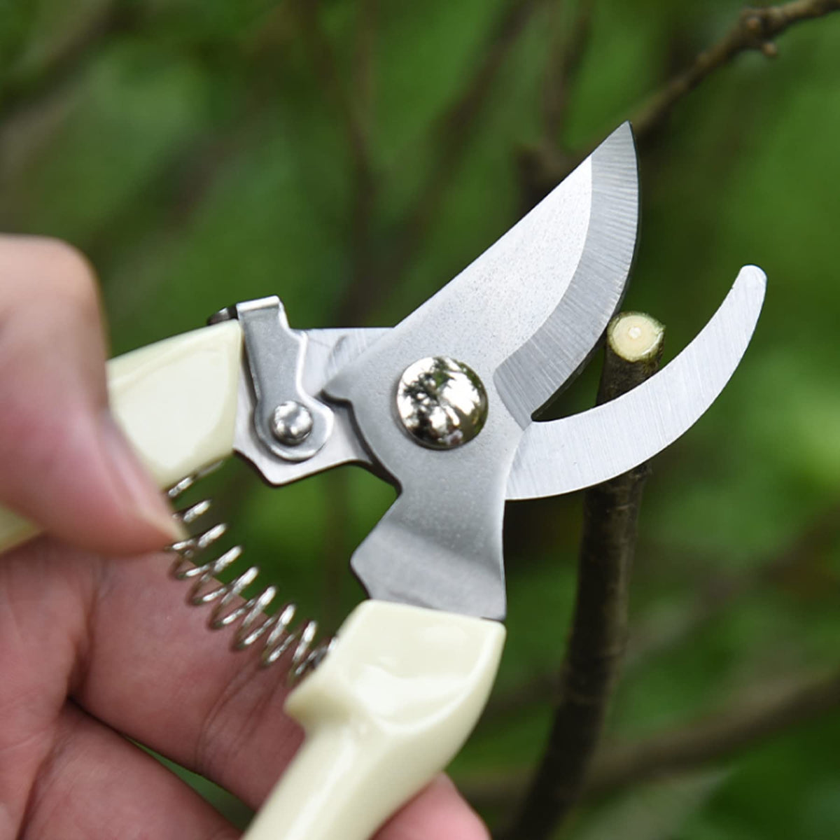 SoftSense bypass pruning shears with safety latch for secure one-handed locking