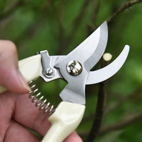 SoftSense bypass pruning shears with safety latch for secure one-handed locking
