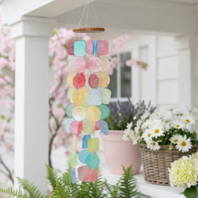 Solange & Frances rainbow wind chimes show wood top detail for relaxed outdoor spaces.