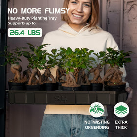 SOLIGT heavy-duty seedling tray filled with soil demonstrates durable, reusable construction.