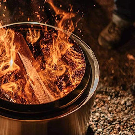 Kiln-dried juniper logs by Solo Stove showing texture for easy ignition