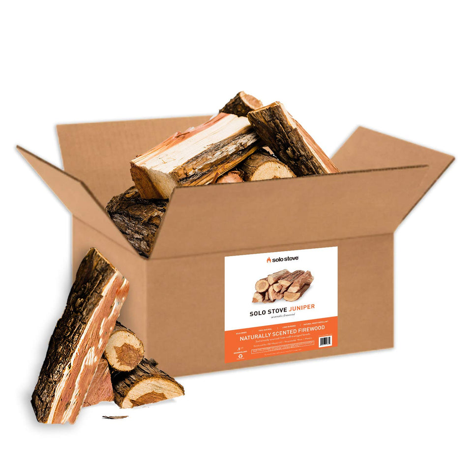 Solo Stove Juniper firewood logs bundle ready to load into a backyard fire pit